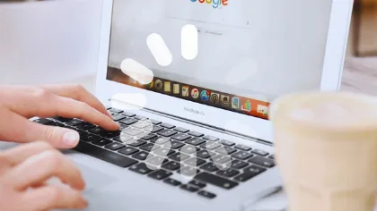 How to Enable Parallel Downloading in Chrome Step by Step Person typing on MacBook Air with Google Chrome browser open