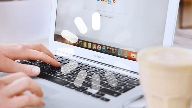 How to Enable Parallel Downloading in Chrome Step by Step Person typing on MacBook Air with Google Chrome browser open
