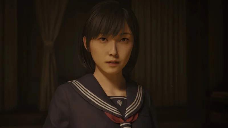 Silent Hill f close-up of the schoolgirl protagonist in her uniform, serious expression in a horror scene